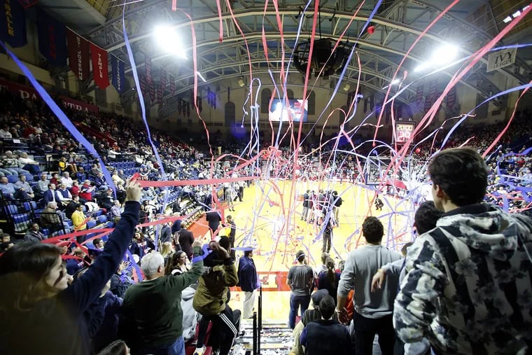 Penn students throw streamers on the court before Penn played St. Joseph's at the Palestra in game two of a Big 5 doubleheader on Wednesday, January 20, 2016.