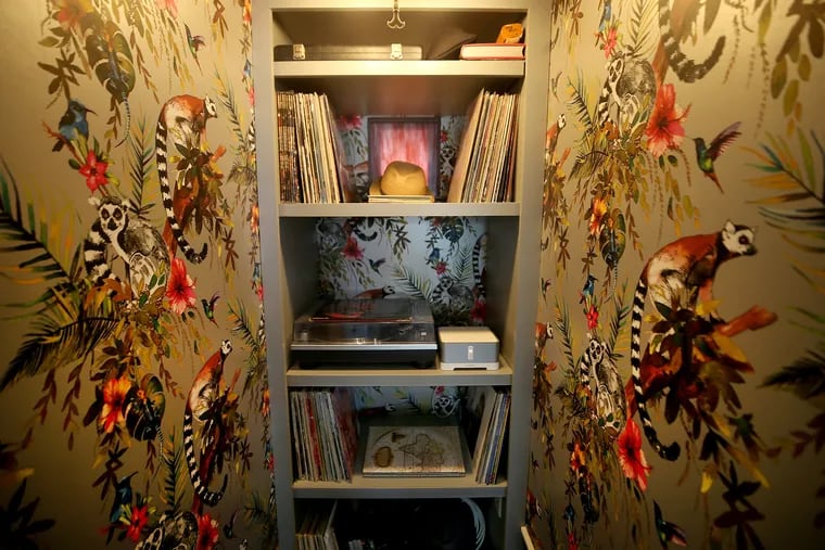 The jungle print wallpaper in the record room, created out of a hall closet, suggests "something interesting is happening there,” says Matthew Cross of South Philadelphia.