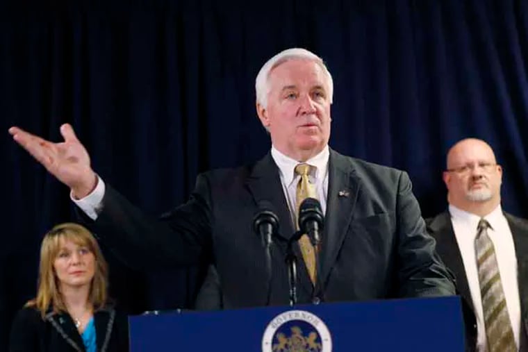 Governor Corbett talks about his budget proposal to increase funding for rape crisis services and prevention education at a press conference held at the offices of Women Organized Against Rape as Kristen Houser (left) and Ralph J. Riviello (right) listen. February 28, 2013. ( MICHAEL S. WIRTZ / Staff Photographer ).