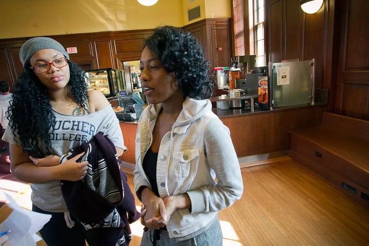 Kaileik Asbury (left), president of Chestnut Hill College's black student union, and Melissa Allen-Bey, its treasurer. They say they want to make their school better for future minority students.