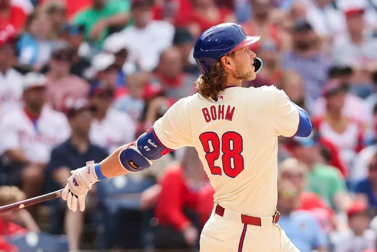 Phillies third baseman Alec Bohm hits a three-run homer during the eighth inning Sunday against the Washington Nationals.
