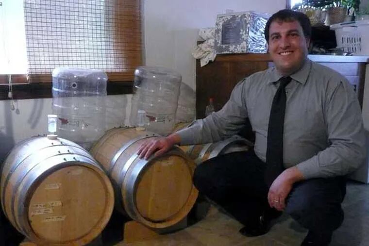 Dan Popernack, of La Cabra, shows off his oak-barreled beers.