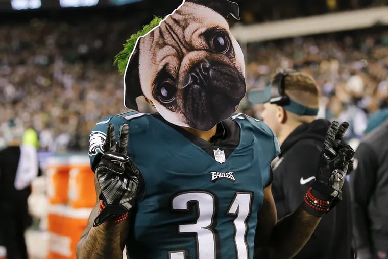 Jalen Mills famously wears a dog mask following the Eagles win over Minnesota in last year's NFC Championship Game.