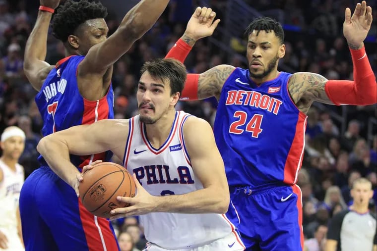 Sixers forward Dario Saric pivots for  basket in the second quarter of the team’s win over the Pistons on Saturday.