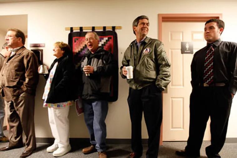 Pennsylvania Democratic Senate candidate, Rep. Joe Sestak, D-Pa., second right, waits in line to cast his ballot in Gradyville, Pa., Tuesday, Nov. 2, 2010. (AP Photo/Matt Rourke)