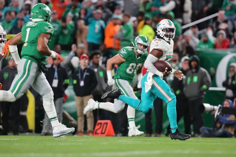 Miami Dolphins linebacker Jerome Baker intercepts Philadelphia Eagles quarterback Jalen Hurts pass in the third quarter to tie the game Sunday, Oct. 22, 2023, in Philadelphia, PA.