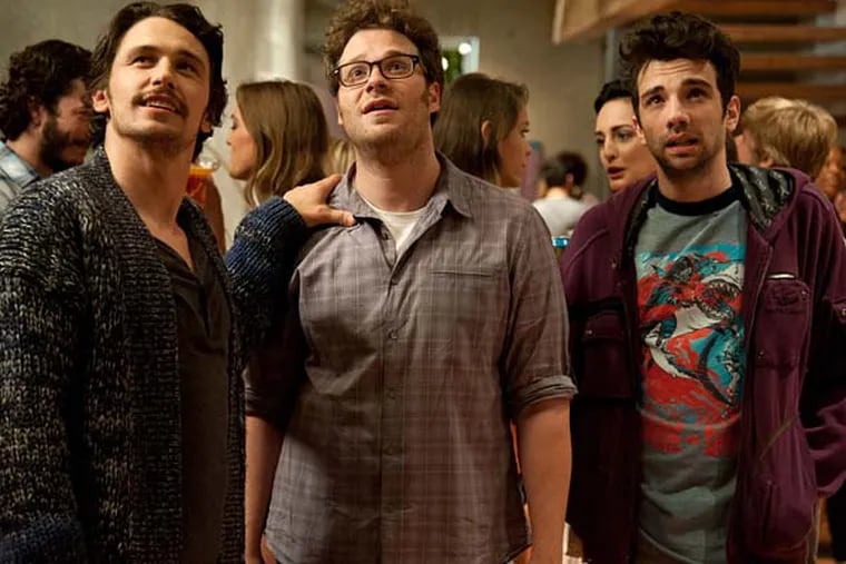 This film publicity image released by Columbia Pictures shows, from left, James Franco, Seth Rogen and Jay Baruchel in a scene from "This Is The End."  (AP Photo/Columbia Pictures - Sony, Suzanne Hanover)