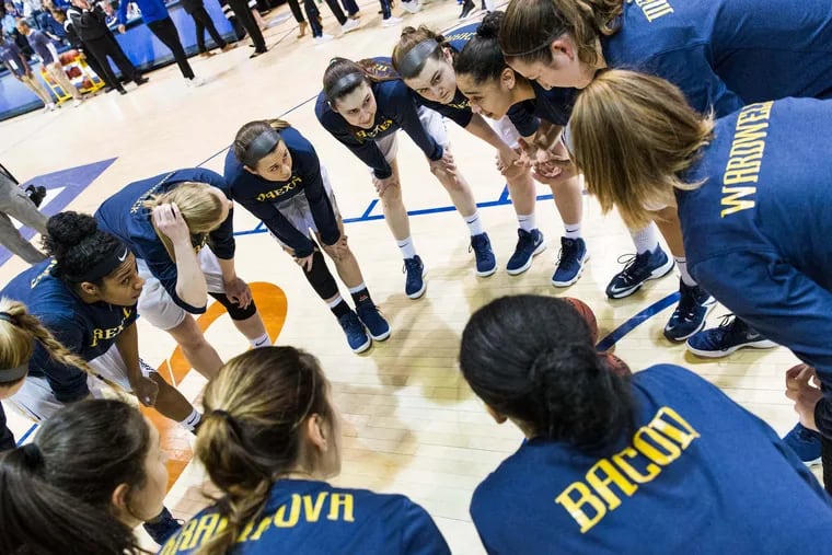 The Drexel women's basketball team huddles up on the court prior to taking on the University of Delaware Blue Hens in the CAA women's basketball tournament at Daskalakis Athletic Center Friday, March 9, 2018.
