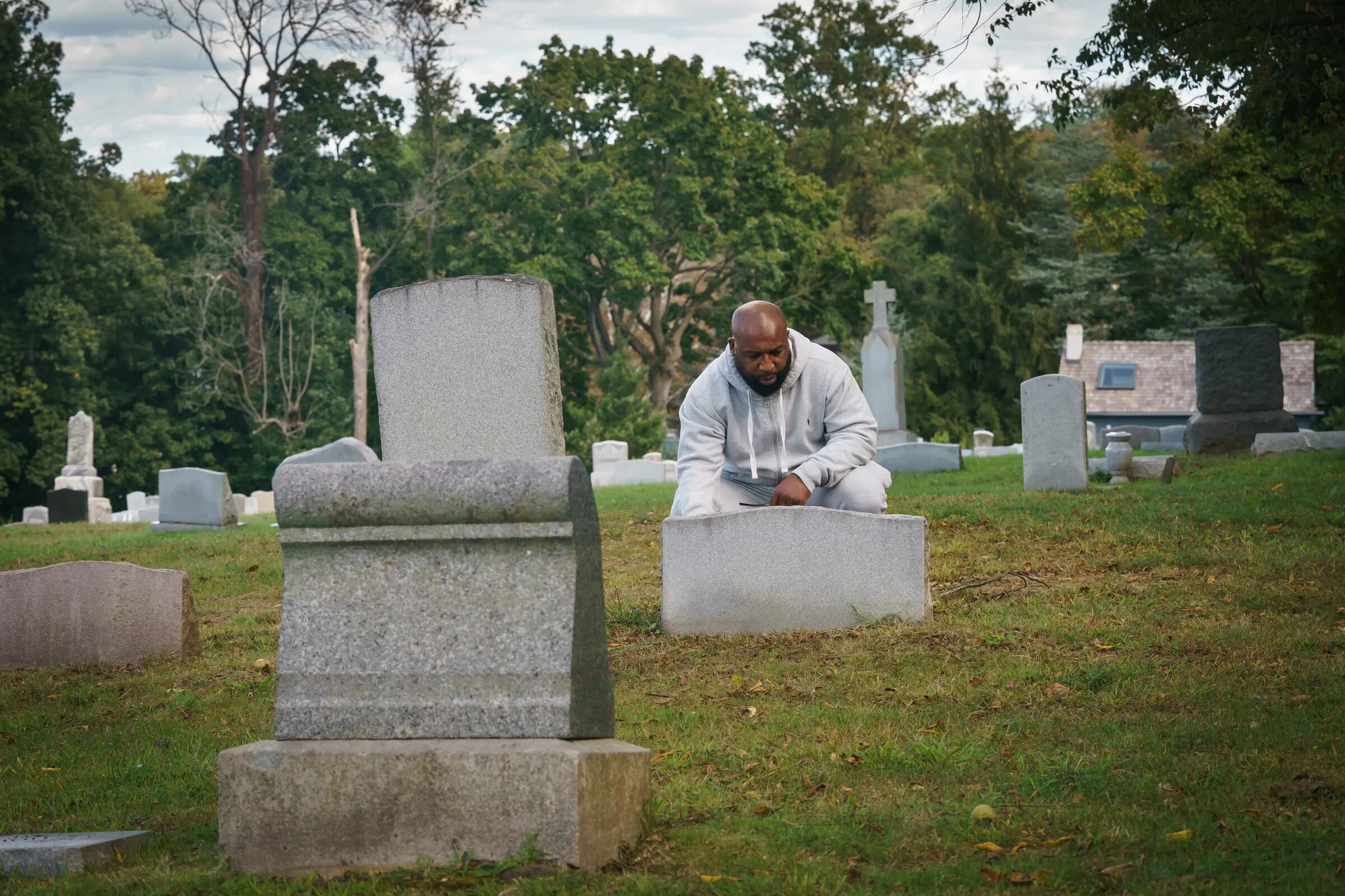 Anthony Wright stops by his mother's grave. He has visited regularly since he was exonerated in 2016, sharing memories and news about his life and the impact of his case.  THE CASE THAT COLLAPSED