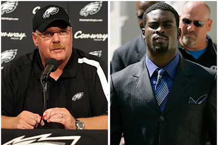 Eagles' Head Coach Andy Reid, left, talks last night about the signing of Michael Vick, right. (Yong Kim / Staff Photographer)