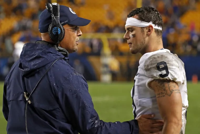 Penn State head coach James Franklin, left, talking with quarterback Trace McSorley (9) during the second half against Pittsburgh.