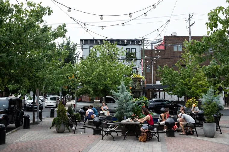 More residents are patronizing local businesses and hanging out in local public spaces, like the Singing Fountain Plaza on East Passyunk Avenue.