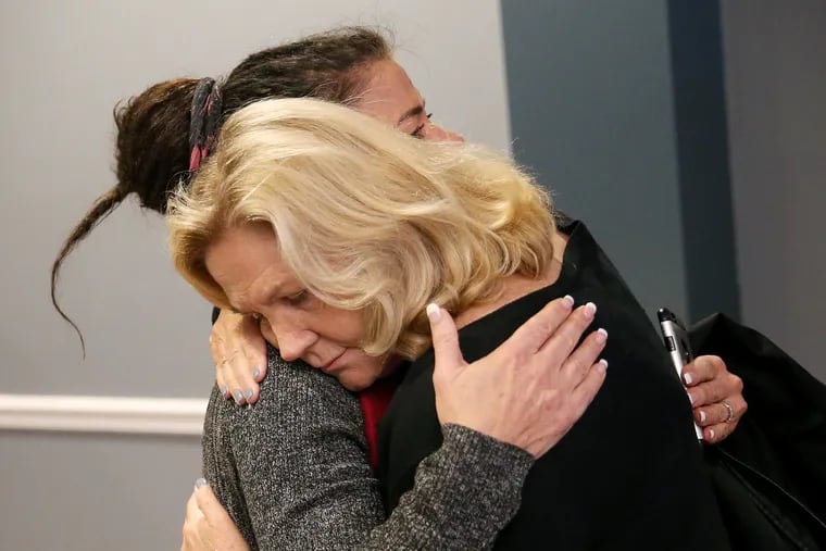 Maureen Faulkner, right, hugs Linda Schellenger after a news conference at the Fraternal Order of Police Lodge 5 in Northeast Philadelphia on Tuesday, Nov. 12, 2019. Faulkner's legal team has filed a king's bench petition to the Pennsylvania Supreme Court in an effort to get the Philadelphia District Attorney's office removed from handling an appeal by Mumia Abu-Jamal, who was convicted of the 1981 murder of Faulkner's husband, police officer Daniel Faulkner. Linda Schellenger is the mother of Sean Schellenger, who was fatally stabbed in Rittenhouse Square in July 2018.