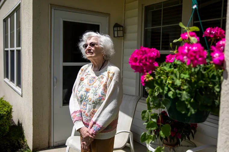 Edith Kalech, 91, Holocaust survivor, stands outside Lions Gate retirement community in Voorhees, where she lives. “I feel really fortunate to be at Lions Gate,” Kalech said. “Having been through difficult times in my life, I learned how to survive and learned how to be helpful.”