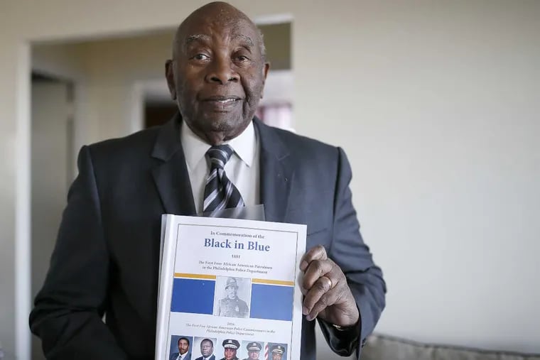 Former Philadelphia Police Chief Inspector Arthur Matthews created a scrapbook chronicling the achievements of black police officers in Philadelphia that he&#039;s titled &quot;Black in Blue.&quot; Matthews is seen in his home in Philadelphia, PA on Jan. 25, 2017.