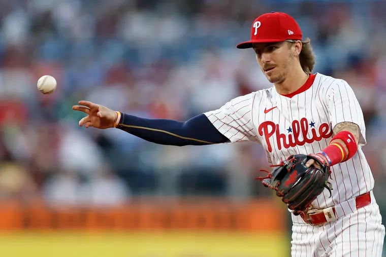Phillies second baseman Bryson Stott will try to keep his readjustment to shortstop simple. "A ground ball is a ground ball. It’s just the throw that is a little farther," he says.