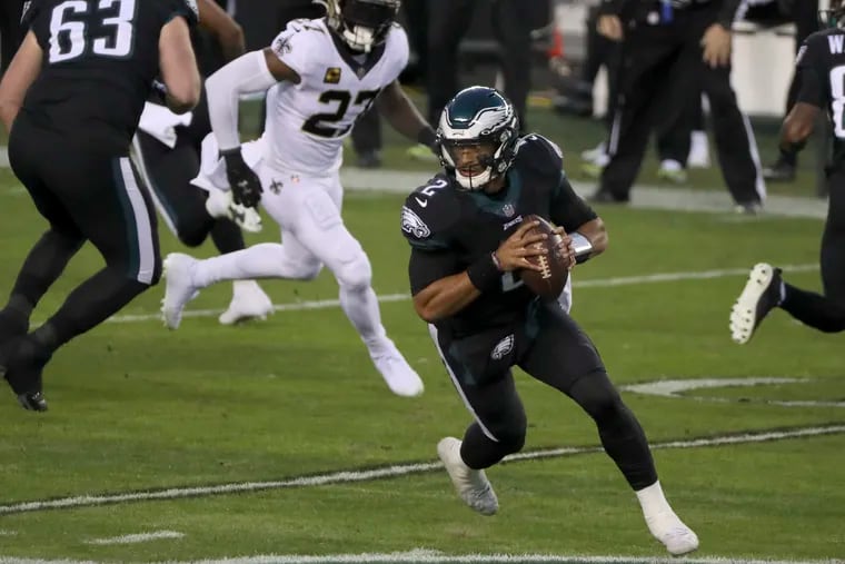 Eagles quarterback Jalen Hurts used his legs to extend plays in his first career start, showing a level of mobility that Carson Wentz couldn't achieve this season.
