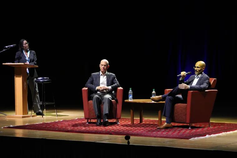 Temple hosted Jim Rooney (left), son of Dan Rooney, and N. Jeremi Duru, a law professor and expert in sports law, for a discussion of the Rooney Rule, its legacy, and how it will continue to impact the present and future of sports and business Wednesday at the Temple Performing Arts Center.