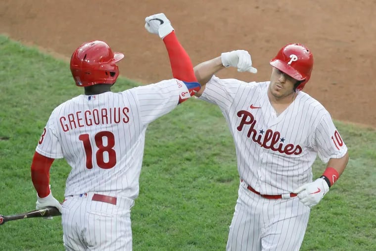 Phillies catcher J.T. Realmuto (right) and shortstop Didi Gregorius will be eligible for free agency at the conclusion of the World Series.