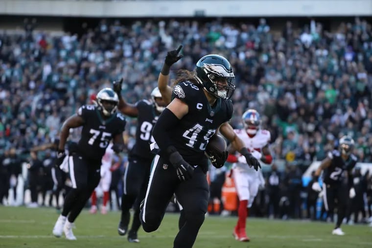 Philadelphia Eagles outside linebacker Alex Singleton (49), intercepts a pass and scores another touchdown for the Eagles during the fourth quarter of the game against the New York Giants at the Lincoln Financial Field in Philadelphia, Pa., on Sunday, Dec., 26, 2021.