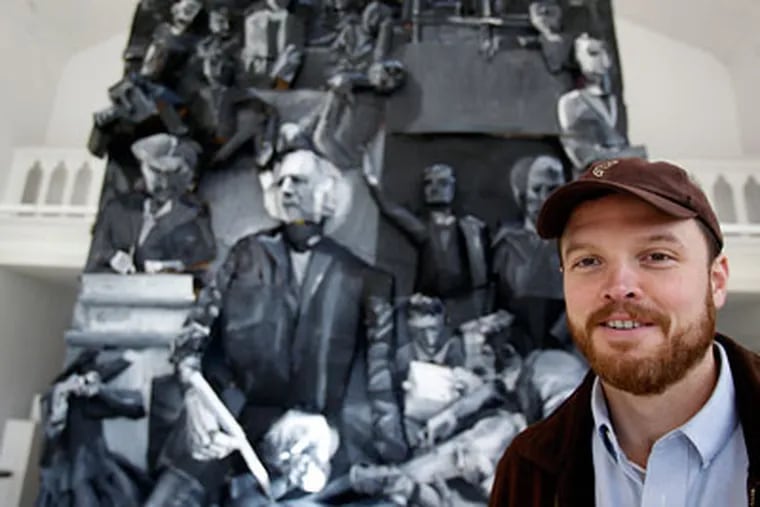 Art Professor, Logan Grider stands in front of the large 3D sculpture of the Gross Clinic at  Swarthmore College.  (Akira Suwa / Staff Photographer )
