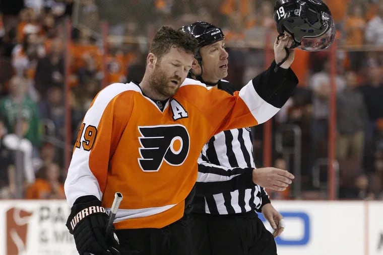Scott Hartnell tips his helmet to the cheering crowd after being penalized for spearing.
