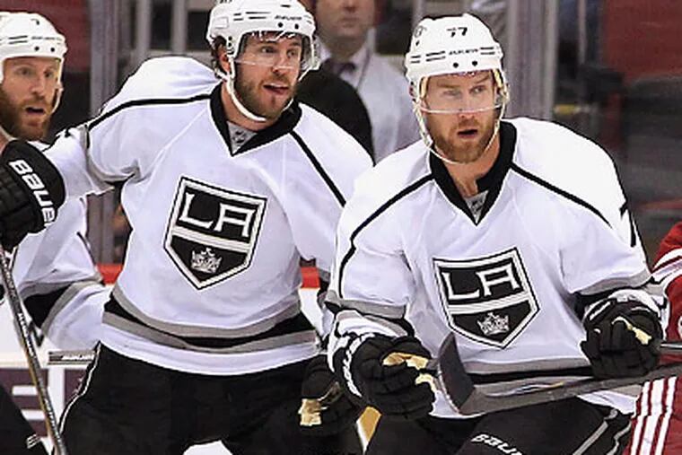 Mike Richards and Jeff Carter could win the Stanley Cup within a year of being traded from Philadelphia. (Ross D. Franklin/AP)