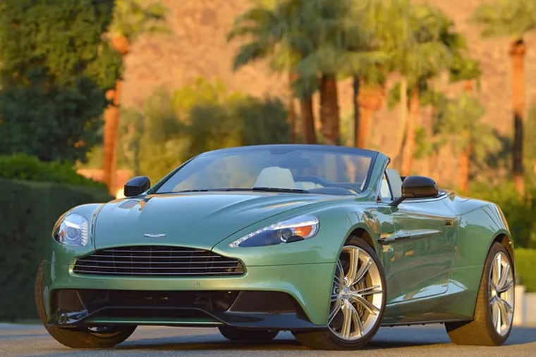 The 2014 Aston Martin Vanquish Volante is a convertible version of the exclusive brand's Vanquish supercar. (Max Earey/Aston Martin/MCT)