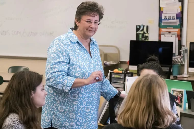 Lee Ann Weitzel, superintendent of Ridley School District in Delaware County, in a graphic design class at Ridley High School. Weitzel is among 21 female school 
 district leaders in the region, where women hold down a third of the top spots compared to 22.4 percent nationwide. Left to right  Kim Holdredge, Lee Ann Wentzel, Sarah Messina.