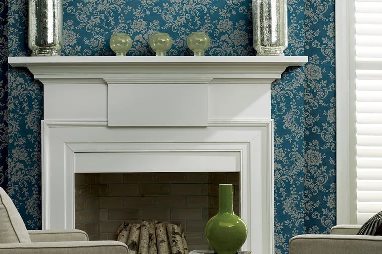 Use wallpaper to highlight a focal point, like a fireplace, or create a new one.