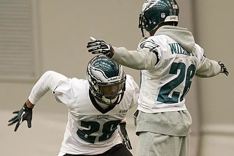 Eagles safety Earl Wolff and cornerback Cary Williams. (Clem Murray/Staff Photographer)