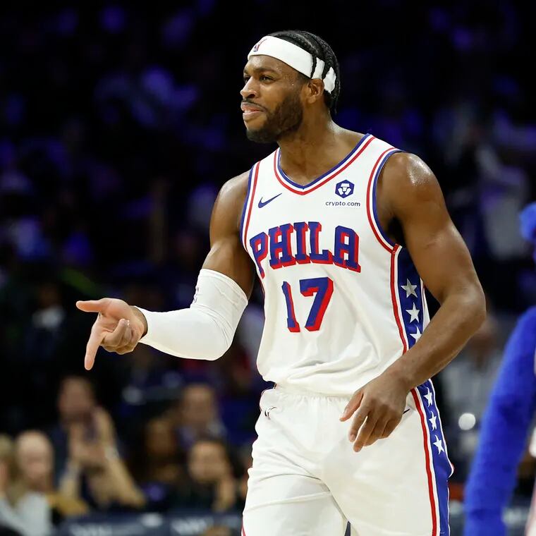 Sixers guard Buddy Hield points his finger after making a three-point basket in the third quarter.