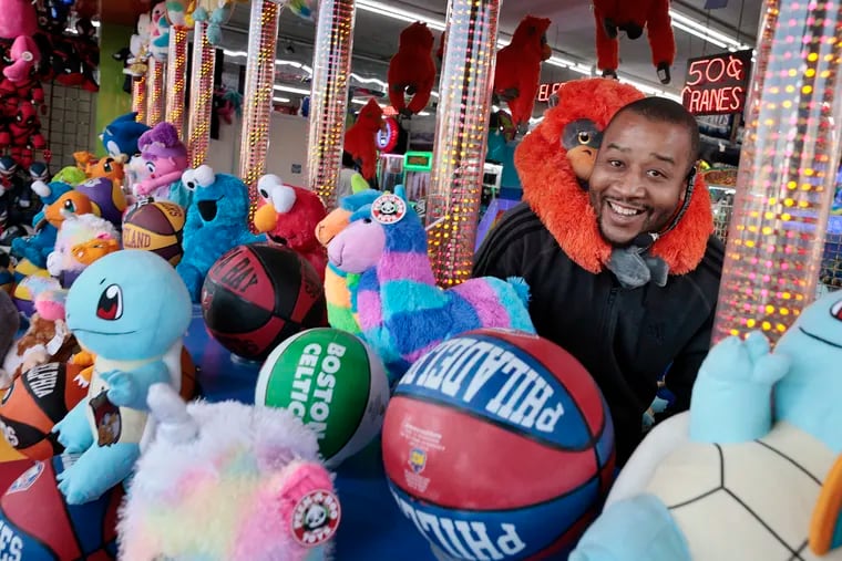 Nick Beamon works the squirt gun at Bobby Dee's Casino arcade in Wildwood on May 14, 2021.