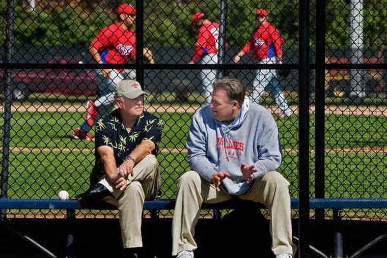 Former Phillies general manager Pat Gillick, left, talking with special assignment scout Charley Kerfeld in 2008. Kerfeld was spared last week from the Phillies' cuts to the pro scouting staff.