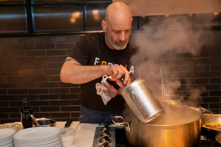 Marc Vetri checks the progress of one of his his pastas during a preview of his 14-seat Italian Market pasta bar Fiorella, at the Fitler Club on December 18, 2019.