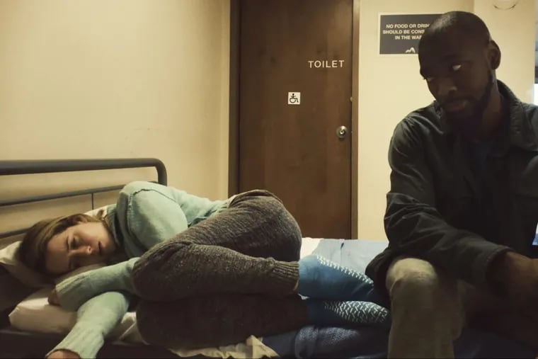 Claire Foy (left) and Jay Pharoah in a scene from ‘Unsane.’