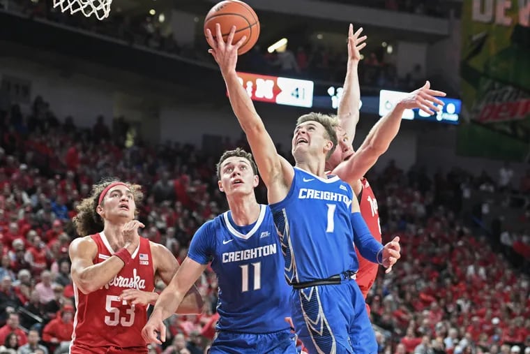 LINCOLN, NEBRASKA - DECEMBER 3: Guard Steven Ashworth #1 of the Creighton Bluejays scores against forward Josiah Allick #53 of the Nebraska Cornhuskers in the second half at Pinnacle Bank Arena on December 3, 2023 in Lincoln, Nebraska. (Photo by Steven Branscombe/Getty Images)