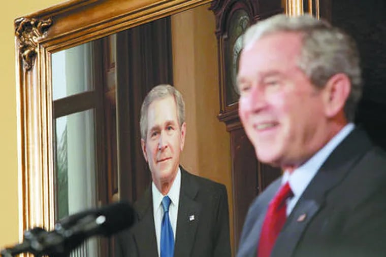 President Bush with his portrait unveiled at the Union Leaguein Philadelphia on Saturday. The president opened his remarks by saying, &quot;Welcome to my hanging.&quot;