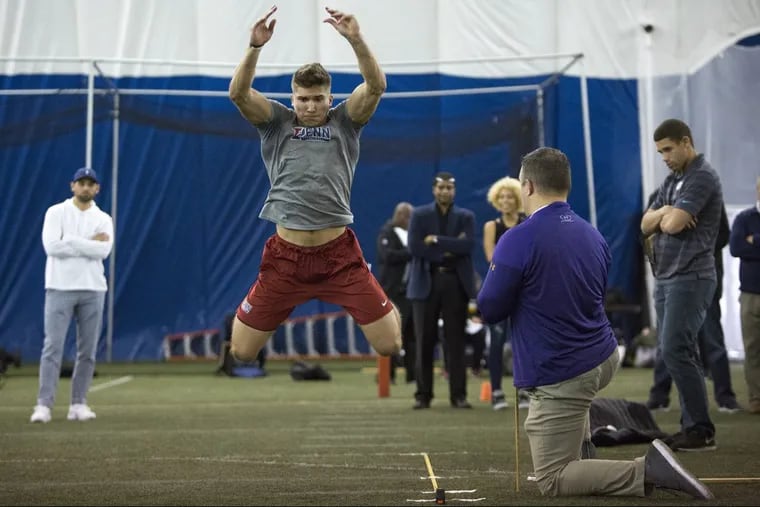 Inside UPenn’s Dunning-Cohen Champions’ Field, Wide Receiver Justin Watson does his long jump for the NFL’s Pro day. March 19th, Philadelphia.