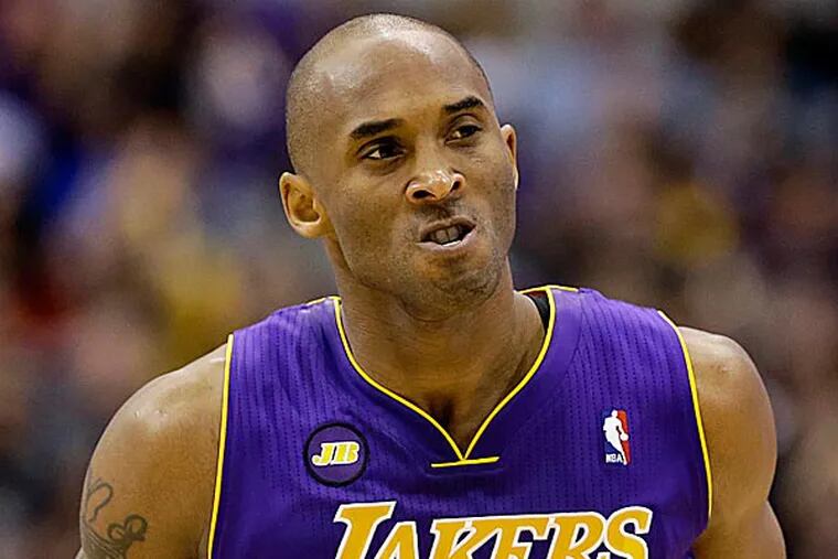 Mark Cuban said during a radio interview Friday that the Lakers could reduce their salary-cap tax by releasing Kobe Bryant under the amnesty provision. (Tony Gutierrez/AP)