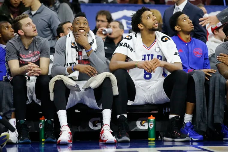 The Sixers bench reacts as they fall behind the Mavericks in the first half at the Wells Fargo Center on Nov. 16, 2015.