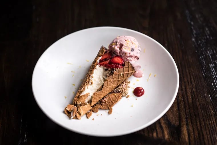 At Vernick Food and Drink, strawberry stracciatella ice cream tops a waffle cone that's spiced with coriander and glazed with dark chocolate. Inside the cone awaits macerated fresh strawberries and a fluffy vanilla-rooibos mousse.