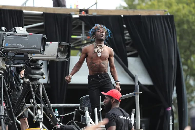 Lil Uzi Vert performs impromptu from the TV platform at the Rocky Stage at the Made in America festivities on the Parkway Saturday, September 3, 2016.