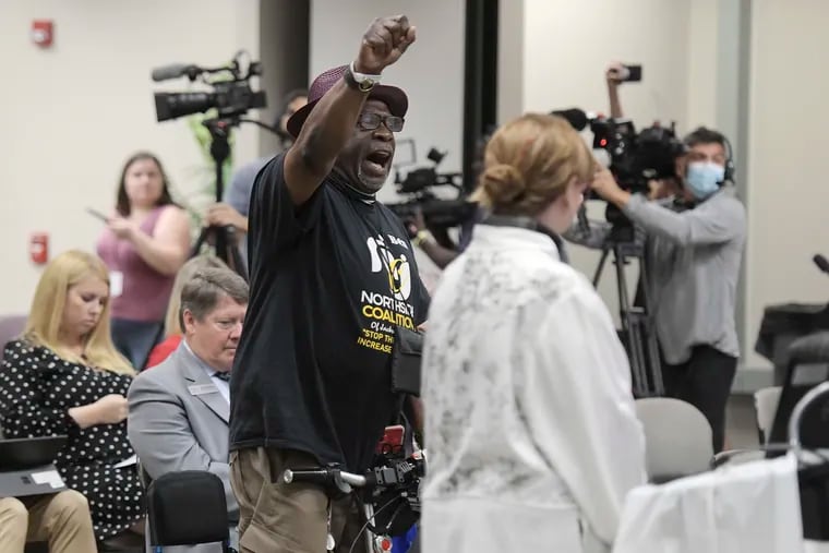 Ben Frazier, the founder of the Northside Coalition of Jacksonville chants "allow teachers to teach the truth" at the end of his public comments opposing the state of Florida's plans to ban the teaching of critical race theory in public schools during the Jacksonville Department of Education meeting in 2021.