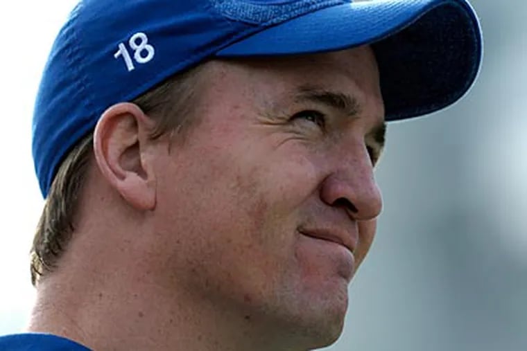 Peyton Manning could be on his way out of Indianapolis after 14 years with the Colts. (Phelan M. Ebenhack/AP)