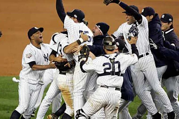 The Yankees captured their 27th World Series title with a 7-3 win in Game 6. (David Swanson / Staff Photographer)