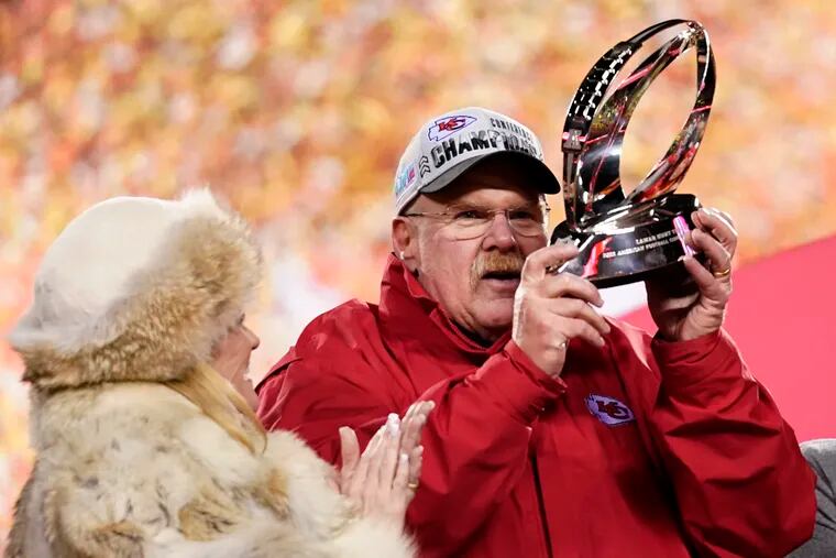 Kansas City Chiefs head coach Andy Reid holds the Lamar Hunt Trophy after the NFL AFC Championship playoff football game against the Cincinnati Bengals, Sunday, Jan. 29, 2023, in Kansas City, Mo. The Chiefs won 23-20. (AP Photo/Brynn Anderson)
