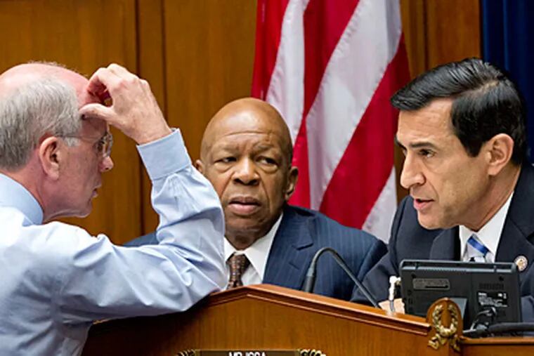 During a House oversight committee hearing, Reps. (from left) Peter Welch, Elijah E. Cummings, and Darrell Issa confer. (AP)