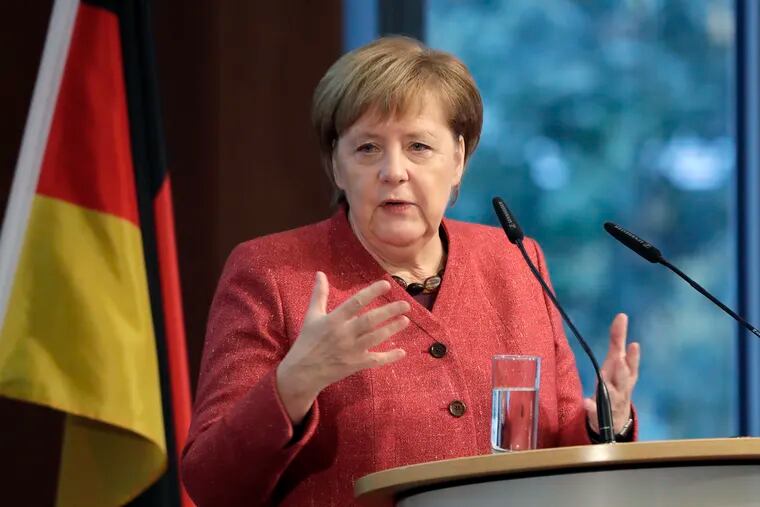 German Chancellor Angela Merkel delivers a speech during the German Ukrainian Economy Forum in Berlin, Germany, Thursday, Nov. 29, 2018. (AP Photo/Michael Sohn)