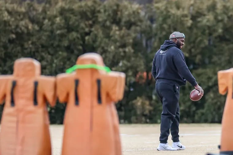 Eagles’ nickels coach Ronell Williams walks the field during practice at the NovaCare Complex. Williams is one of a handful of coaches in the league with a focus on the position.